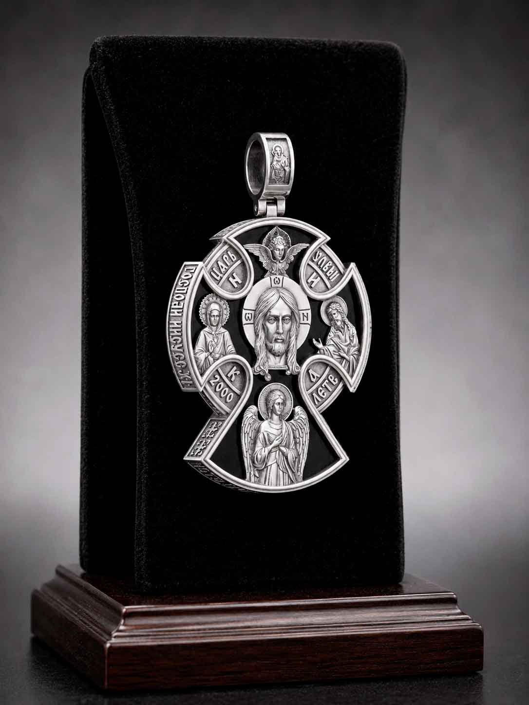 Silver Orthodox Cross "Heavenly Protection" (Art. 650432) Silver Orthodox cross pendant with ebony wood insert featuring the Virgin Mary, St. Nicholas, and St. Panteleimon